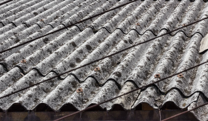 Close-up view of damaged asbestos