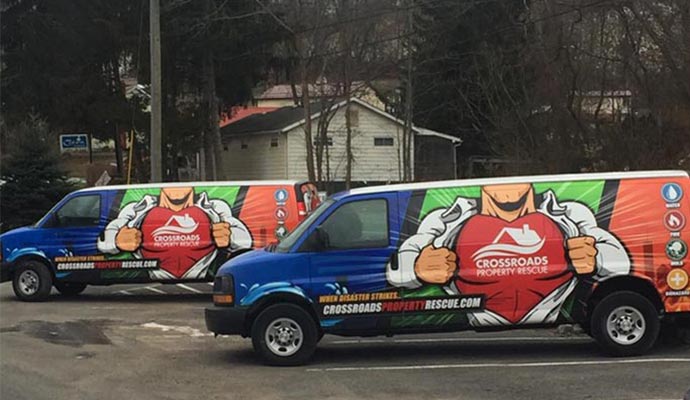 Crossroads property rescue service vans. Crossroads property rescue service vans.