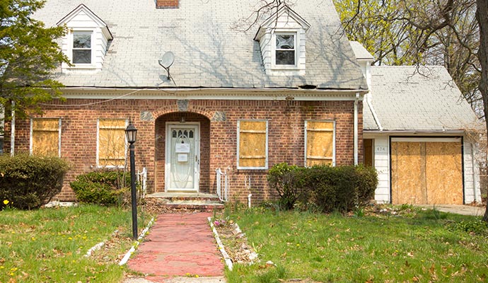 Boarded up house.