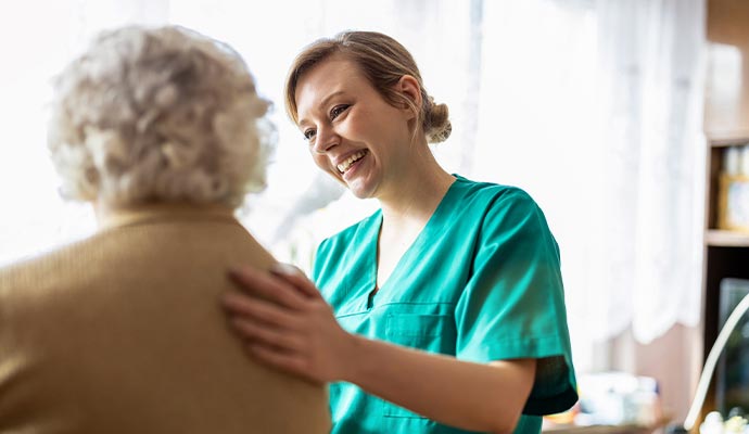 In-home senior care Caregiver with an elderly patient.