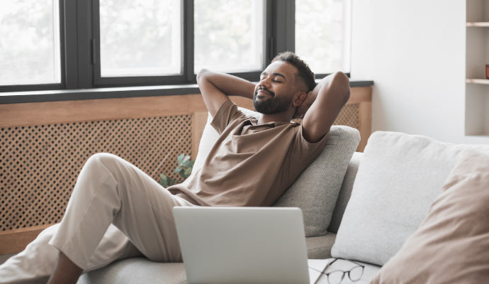 Person relaxing in a clean and comfortable room