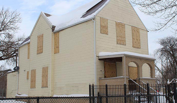 a boarded up house