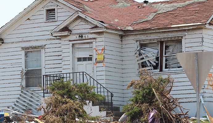 A house destroyed in the aftermath of a storm